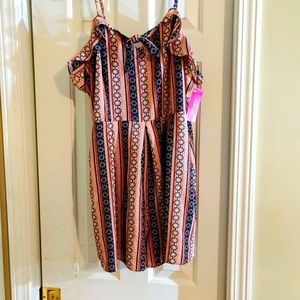 Cute Romper. Never worn. Comes a tags Size XXL.